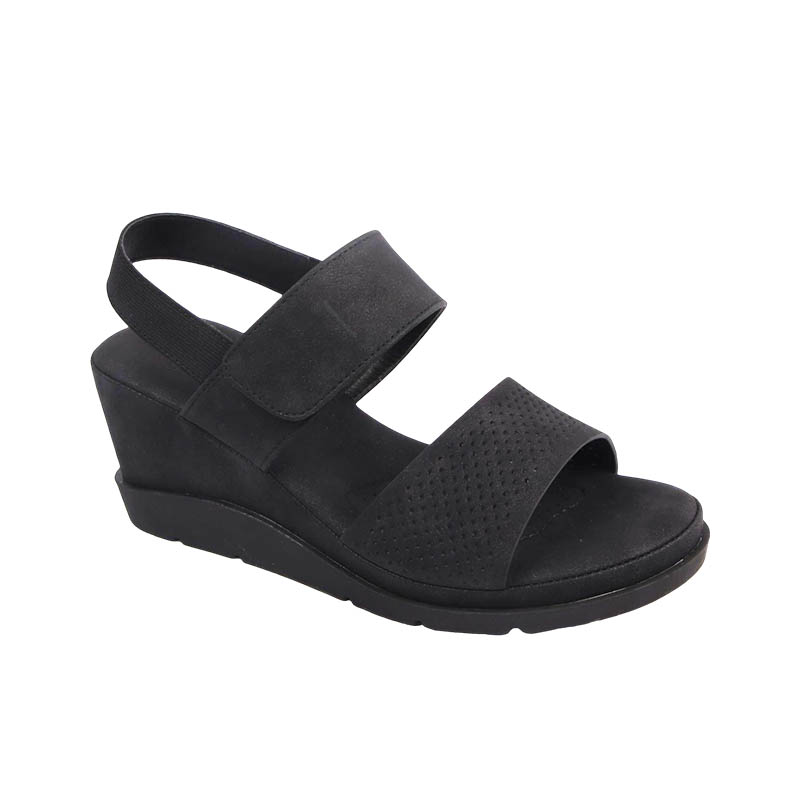 How do flat-soled or low-wedge-heeled casual sandals strike a balance between comfort and elegance?
